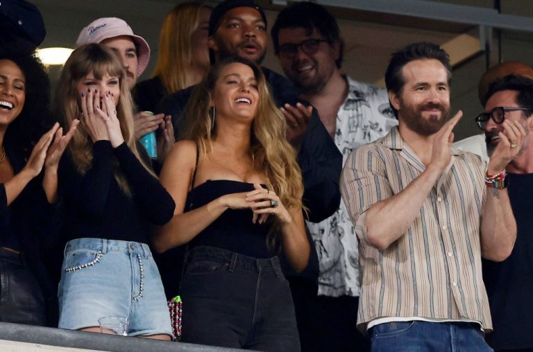 Blake Lively and Ryan Reynolds kiss at Taylor Swift concert: Watch it happen.