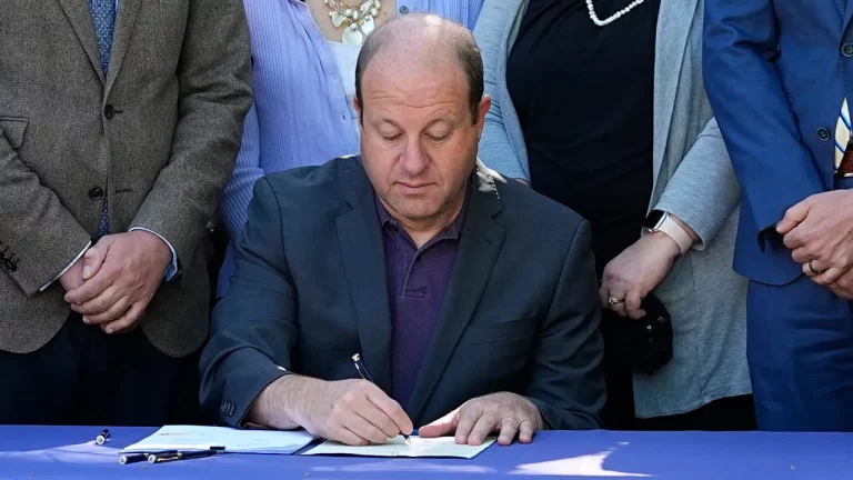 Colorado Governor Polis signs new laws to regulate funeral homes.
