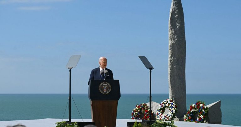 Biden warns of democracy threat at WWII site in Normandy.