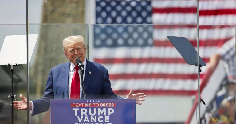 Trump is holding outdoor rallies with bulletproof glass.